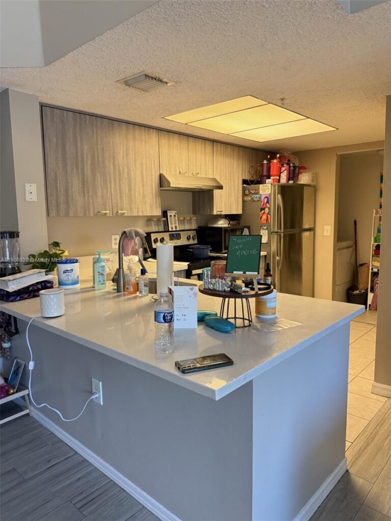5015 Wiles Rd # 207, Coconut Creek FL 33073