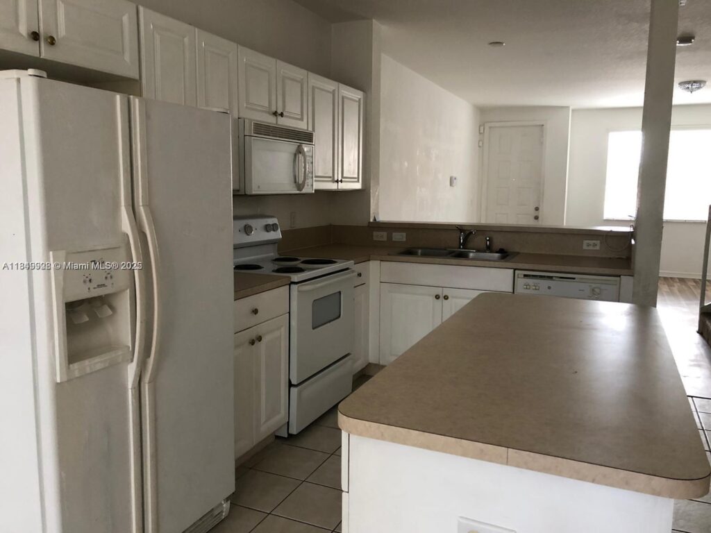 1911 Hibiscus Ln, Riviera Beach FL 33404